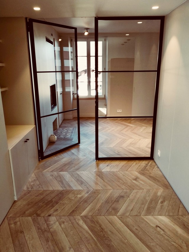 Interesting and warm herringbone flooring in this playroom extension